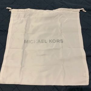 Satin white Michael Kors dust bag